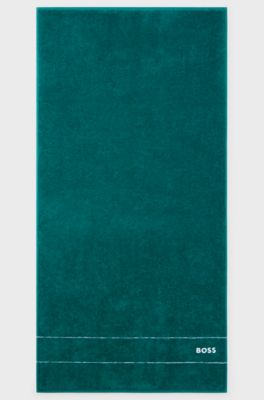 Serviette de bain en coton avec logo brod&eacute; blanc, Vert sombre