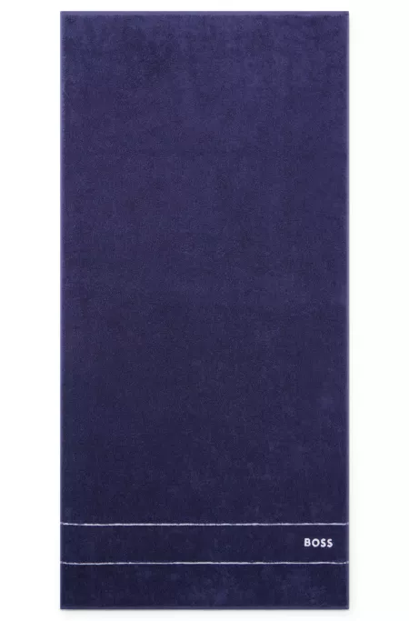 Cotton bath towel with white logo embroidery
