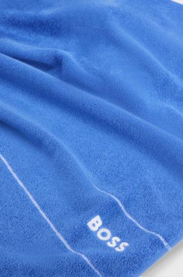 Cotton bath towel with white logo embroidery, Blue