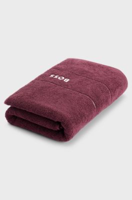 Serviette de bain en coton avec logo brod&eacute; blanc, Violet fonc&eacute;