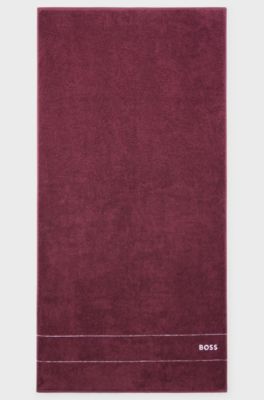 Serviette de bain en coton avec logo brod&eacute; blanc, Violet fonc&eacute;