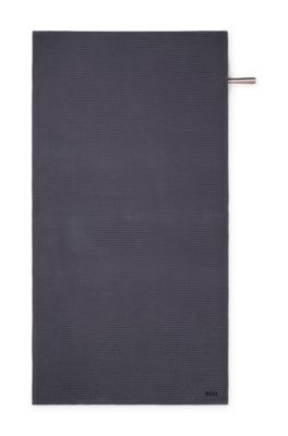 Honeycomb-cotton bath towel with signature-stripe strap, Dark Grey