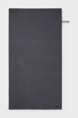 Honeycomb-cotton bath towel with signature-stripe strap, Dark Grey