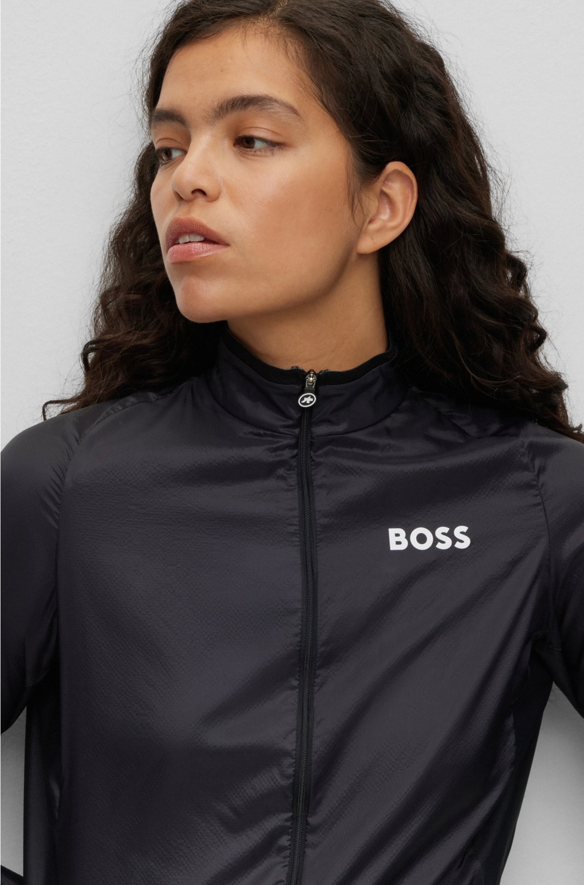 BOSS x ASSOS packable wind jacket with stretch-mesh inserts, Black