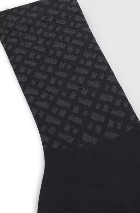 BOSS x ASSOS moisture-wicking cycling socks with seamless construction