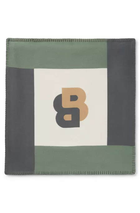 Jacquard cushion cover with whipstitching