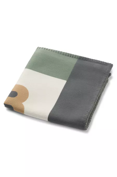 Jacquard cushion cover with whipstitching