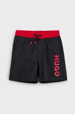 Kids' quick-dry swim shorts with vertical logo, Black