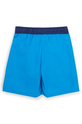 Kids' quick-dry swim shorts with vertical logo, Blue