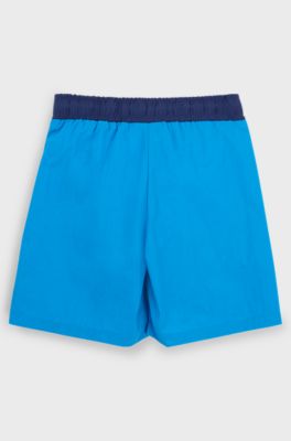 Kids' quick-dry swim shorts with vertical logo, Blue