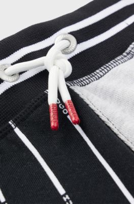 Kindershorts van een katoenmix met verschillende logo&rsquo;s, Zwart