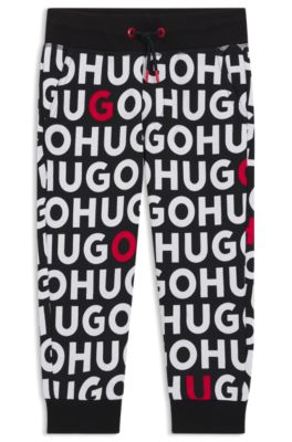 Kids' cotton-blend tracksuit bottoms with repeat-logo print, Patterned