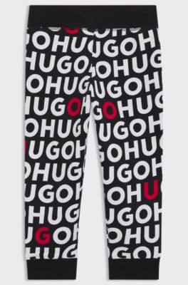 Pantaloni della tuta per bambini in misto cotone con stampa del logo ripetuto, A disegni