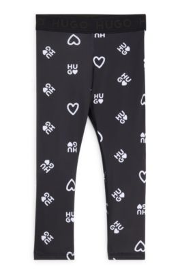 Kids' stretch leggings with hearts and logo print, Black