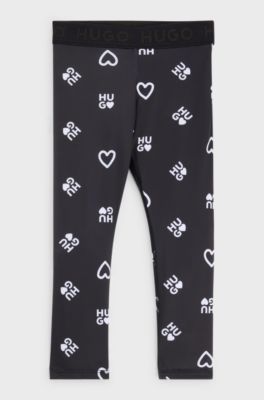 Leggings elasticizzati per bambini con stampa con cuori e logo, Nero