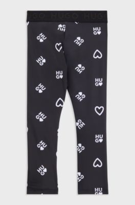 Kids' stretch leggings with hearts and logo print, Black