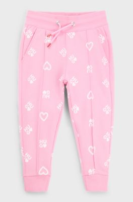 Pantalones de ch&aacute;ndal para ni&ntilde;os en algod&oacute;n con corazones y logos, Pink