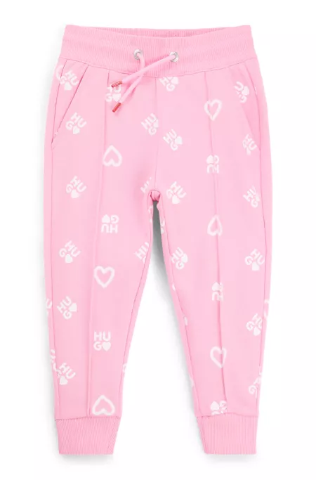 Bas de survêtement en molleton de coton mélangé à imprimé cœurs et logos pour enfant
