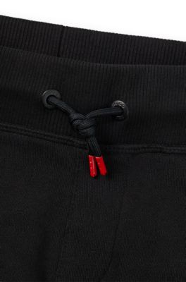 Kids' cotton-blend tracksuit bottoms with logo print, Black