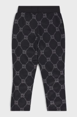 Pantaloni della tuta per bambini dal taglio morbido con logo scomposto stampato, Nero a motivi