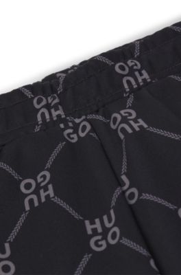 키즈 스택 로고 프린트 루즈 핏 트랙수트 팬츠, 패턴