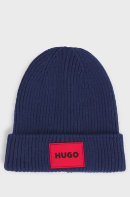 Kids' knitted beanie hat with red logo label, Dark Blue