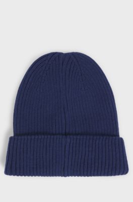 Kids' knitted beanie hat with red logo label, Dark Blue