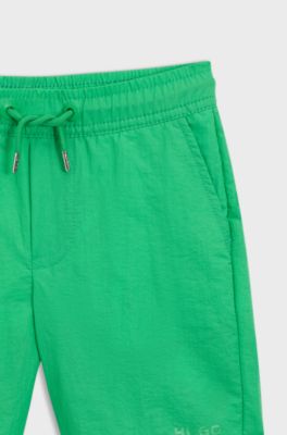 Kids-Badeshorts im Surfer-Look mit Logo-Print, Gr&uuml;n