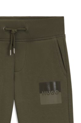 Kids' cotton-blend-fleece tracksuit bottoms with split logo, Dark Green