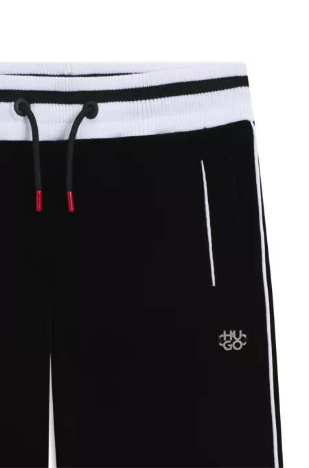 Bas de survêtement en velours stretch à rayures côtelées pour enfant