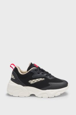 Kids' trainers in faux leather with translucent trims, Black