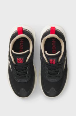 Kindersneakers van imitatieleer met doorschijnende details, Zwart