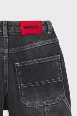 Jeans loose fit bambini in denim elasticizzato nero, Nero