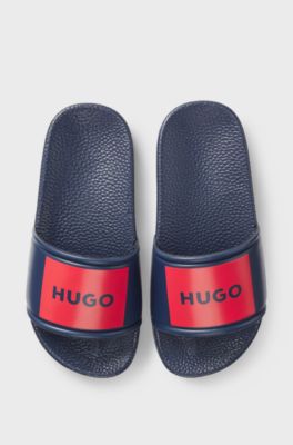 Kids' slides with red logo label, Dark Blue