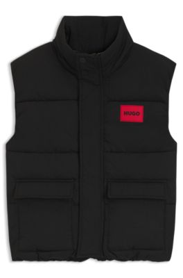 Kids' padded gilet with red logo badge, Black