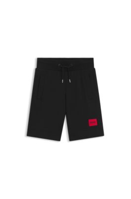 Kids' fleece shorts with logo label, Black