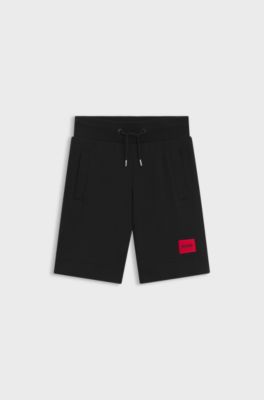 Kids' fleece shorts with logo label, Black
