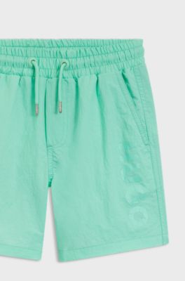 Badshorts f&ouml;r barn med kontrasterande tryckt logga, Gr&ouml;n