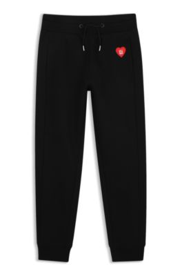 Kids' tracksuit bottoms, Black