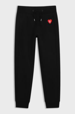 Kids' tracksuit bottoms, Black