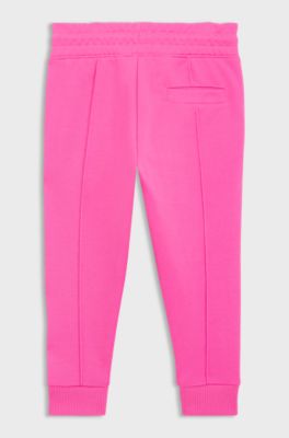 Kids' fleece tracksuit bottoms with logo details, Pink