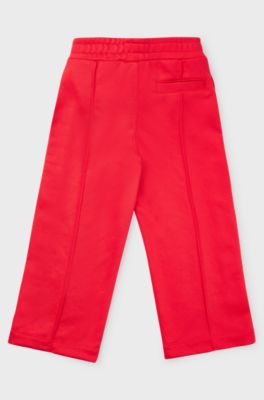 Pantaloni della tuta per bambini con bottoni automatici sulle cuciture laterali, Rosso