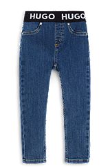Kids' jeggings in blue stretch denim with branded waistband, Patterned