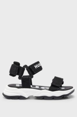 Tweekleurige kindersandalen met logobandje, Zwart