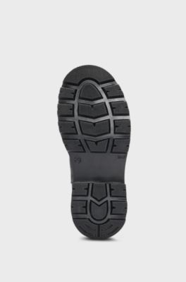 Kids' Chelsea boots in leather with red logo badge, Black