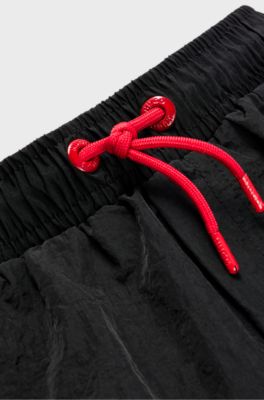 Kids' swim shorts with logo print, Black