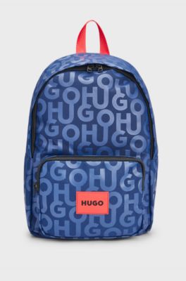 Kids' canvas backpack with all-over stacked logos, Dark Blue