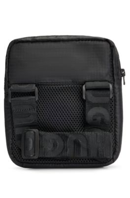 Skuldertaske med r&oslash;dt logom&aelig;rkat til b&oslash;rn, Sort