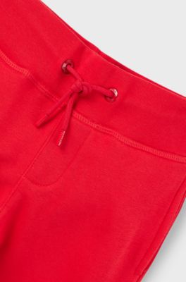 Kids' cotton-blend tracksuit bottoms with contrast logo, Red