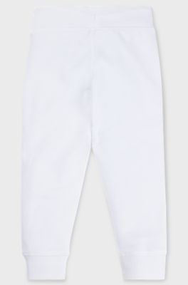 Kids' fleece tracksuit bottoms with marker-style logo, White